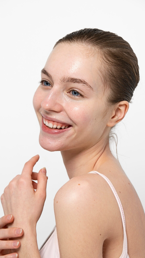A Woman Smiling With Oily Skin