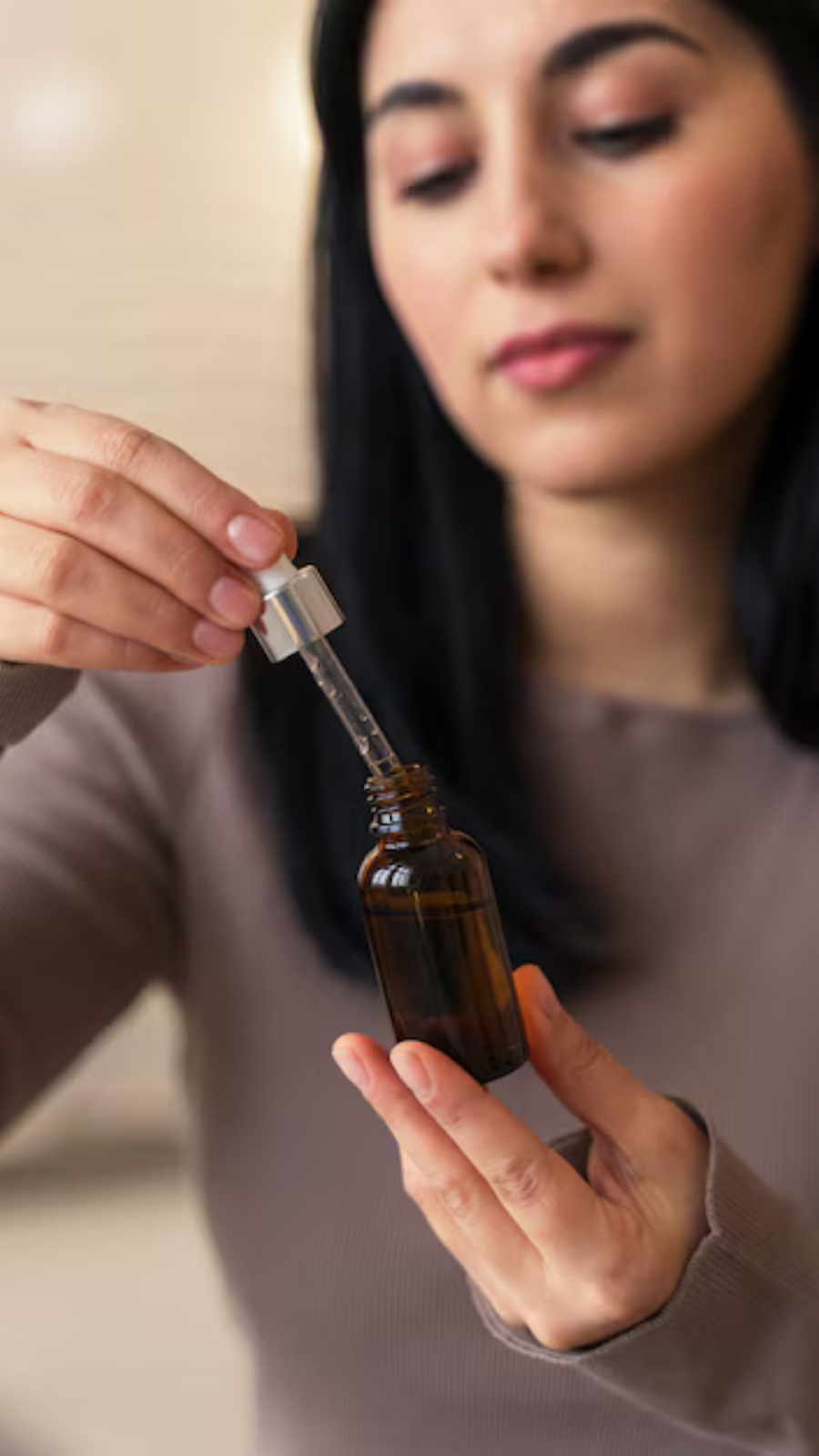 Woman Trying Our Serum For Oily Skin